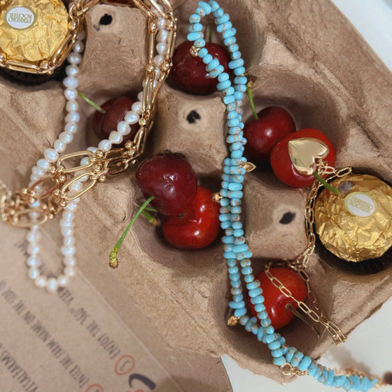 ATHENA BEADED CHARM NECKLACE